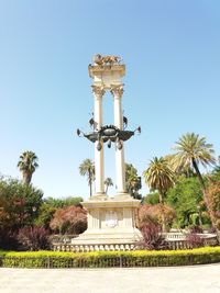 Statue of building against blue sky