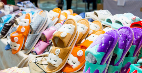 Various lovely slippers on table