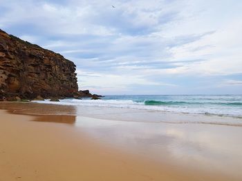 Scenic view of beach against sky