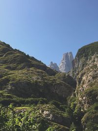 Low angle view of mountains against clear sky