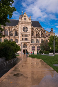 View of historic building against cloudy sky