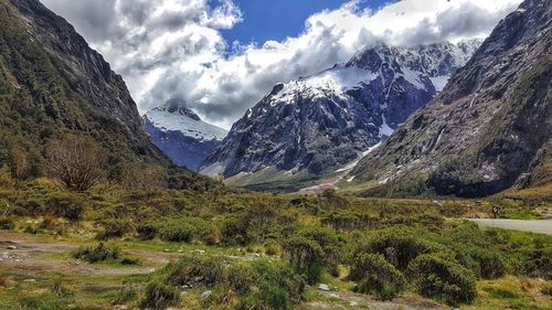 Scenic view of snowcapped mountains against sky