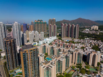 Aerial view of cityscape against sky