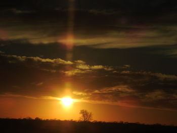 Scenic view of silhouette landscape against sky during sunset