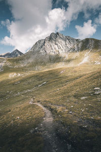 Scenic view of landscape and mountains against sky