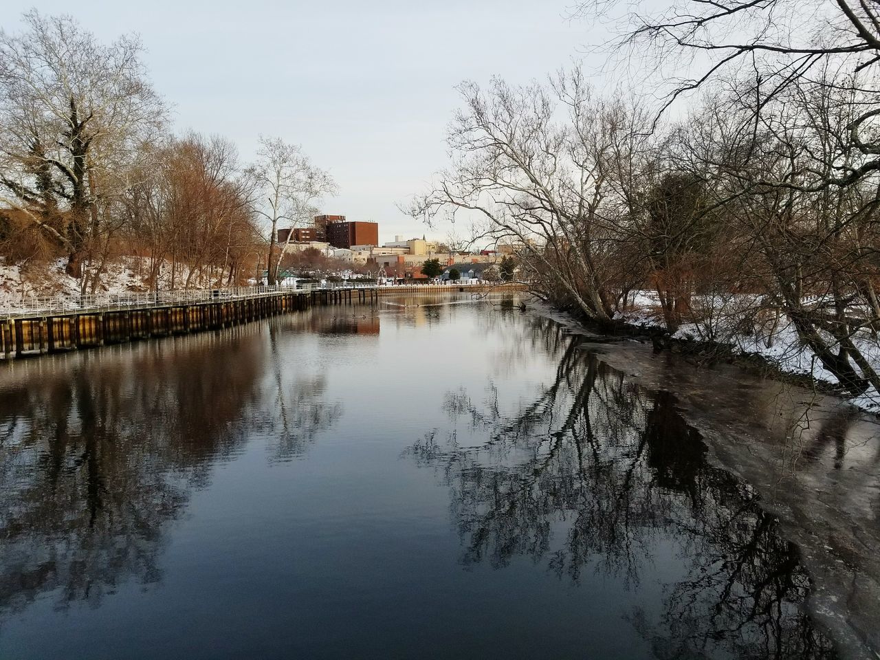 architecture, built structure, tree, building exterior, bare tree, house, reflection, water, outdoors, no people, day, sky, town, nature, beauty in nature, branch, winter, cold temperature