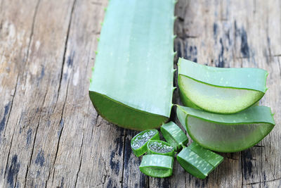 Close-up of aloe vera on wooden table