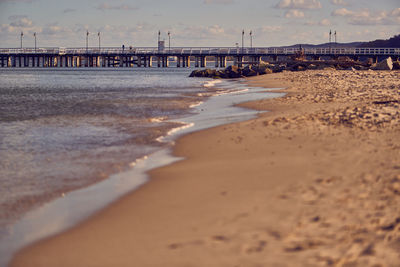 View of beach at sunset