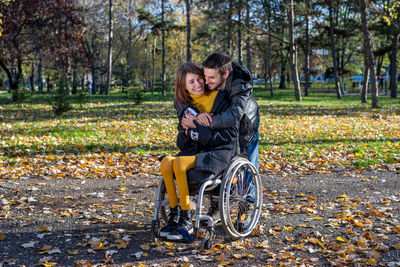 Young woman in park during autumn