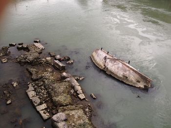 High angle view of abandoned boat in water
