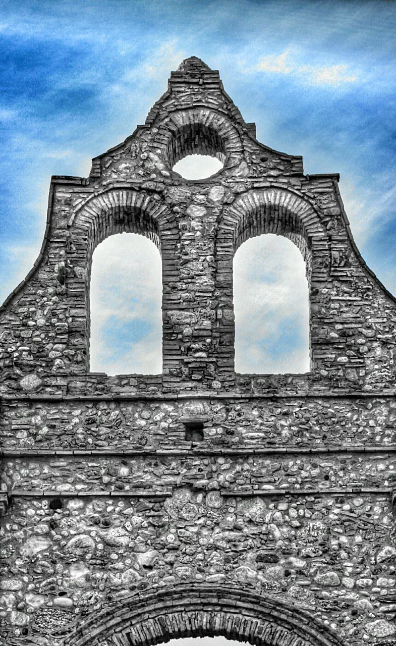 architecture, low angle view, built structure, building exterior, arch, sky, window, history, blue, tower, cloud - sky, day, cloud, old, no people, church, religion, outdoors, building, the past