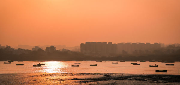 Scenic view of sea against sky during sunset