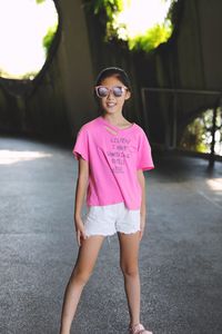 Portrait of girl standing on street