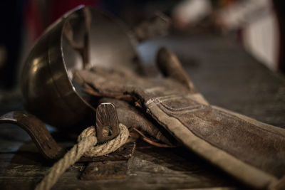 Close-up of rusty metal on table