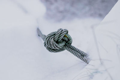 High angle view of tied on steel rope