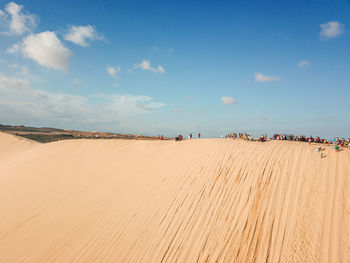 Panoramic view of desert against sky
