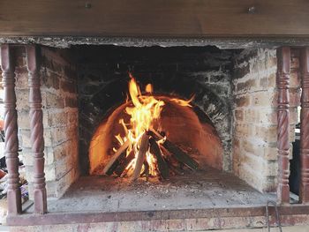 Bonfire on wooden wall