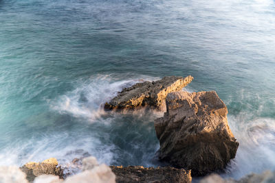 High angle view of sea shore against sky