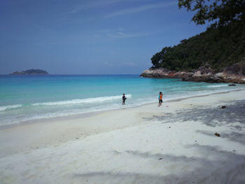 Scenic view of beach against sky