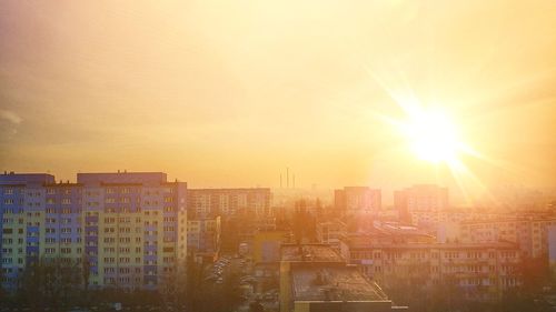 Cityscape against sky during sunset