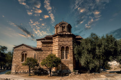 Low angle view of historic building against sky