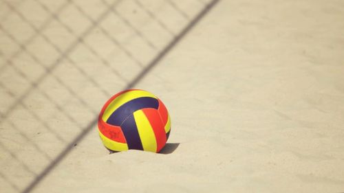 High angle view of multi colored ball on beach