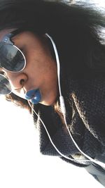 Close-up of young woman in sunglasses