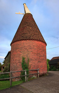 Low angle view of old building against sky