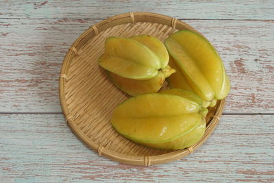 High angle view of fruits in container on table