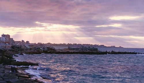 Scenic view of sea against sky at sunset