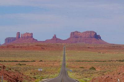 Scenic view of landscape against sky, monument valley