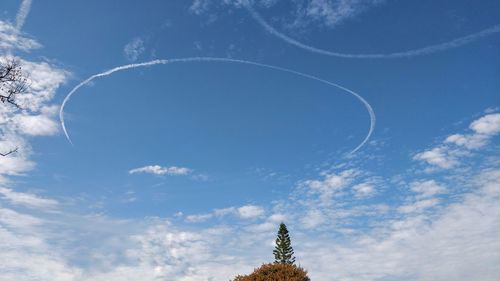 Low angle view of vapor trail in sky