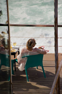 Woman sitting on chair