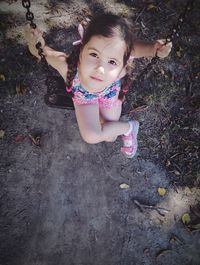 High angle view of cute girl on field