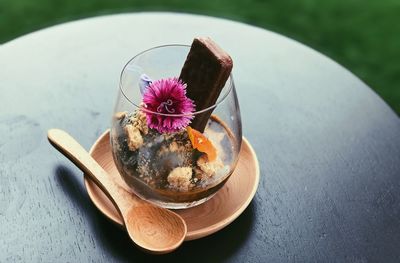 High angle view of dessert in drinking glass on table