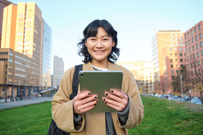 Young woman using mobile phone