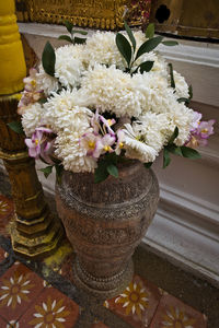 Close-up of flower vase on table