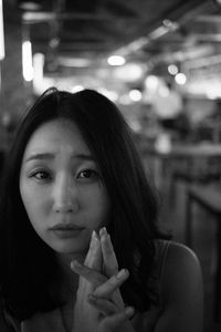 Close-up of woman at cafe