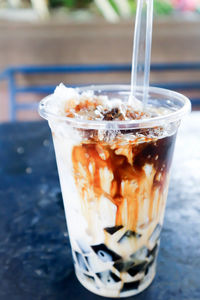 Close-up of ice cream in glass on table