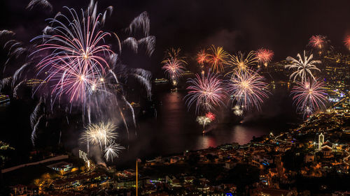 Firework display at night