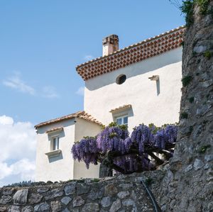 Low angle view of building against blue sky