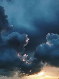 Low angle view of cloudy sky during sunset