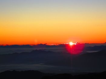 Scenic view of mountains at sunset