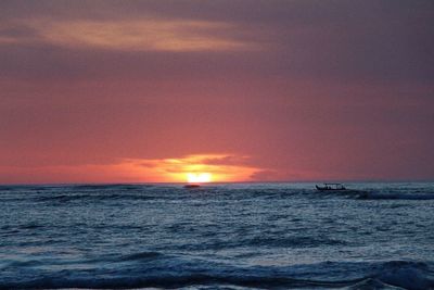 Scenic view of sea against clear sky during sunset