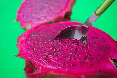 Close-up of strawberry over white background