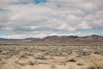 Scenic view of desert against sky