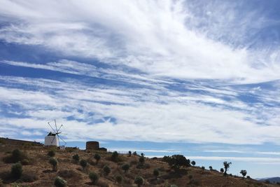 Low angle view of castle on hill against sky