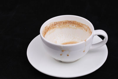 Close-up of coffee cup on table