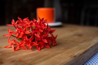 Close-up of red chili peppers on table