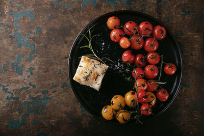 High angle view of fruits in bowl on table